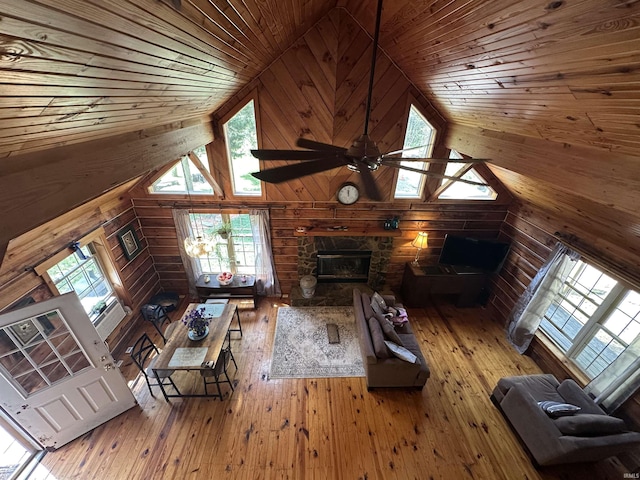 2340 W County Rd 550 S, Paoli, IN 47454 - living room with wood walls, ceiling fan, high vaulted ceiling, and wooden ceiling