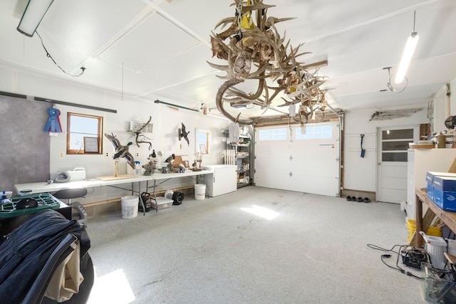 garage with a workshop area