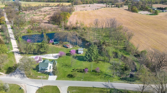 aerial view with a water view and a rural view