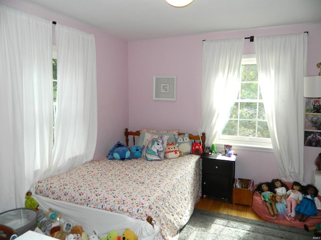 bedroom featuring wood finished floors