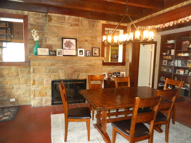 dining space with a fireplace, wood ceiling, beamed ceiling, and a notable chandelier