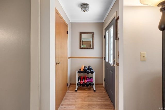 entryway with light wood-style floors