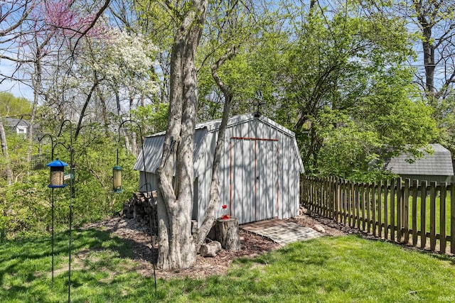 view of shed with fence