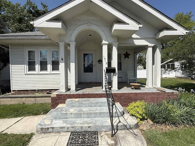 property entrance featuring covered porch