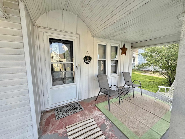 property entrance featuring covered porch