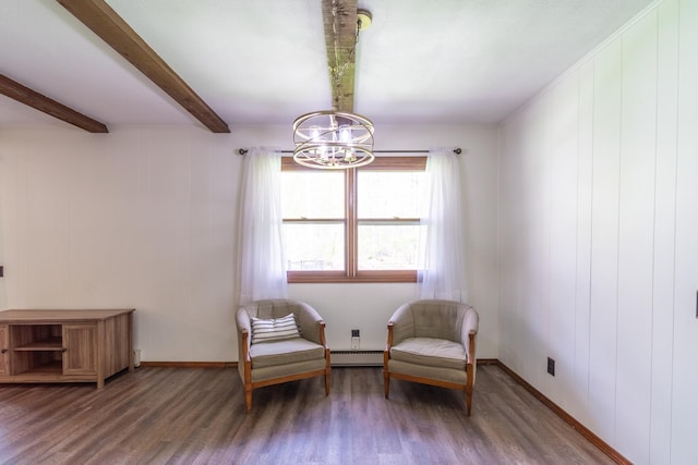 living area featuring wood finished floors, beam ceiling, baseboards, a baseboard heating unit, and a chandelier