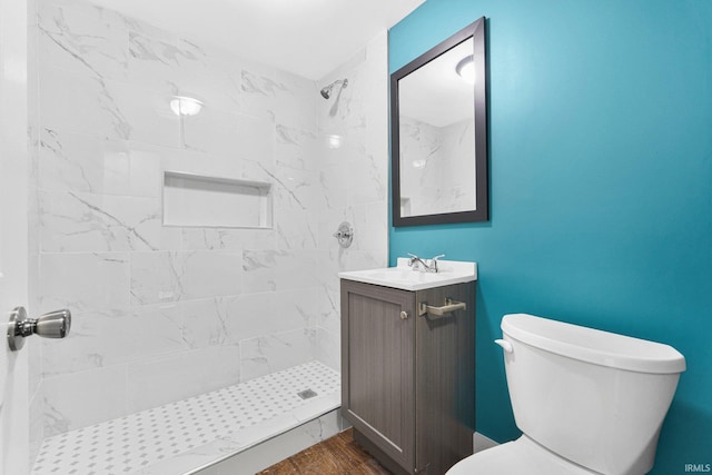 2922 Plaza Dr, Fort Wayne, IN 46806 - bathroom featuring vanity, a shower stall, toilet, and wood finished floors