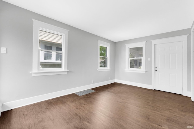 2922 Plaza Dr, Fort Wayne, IN 46806 - interior space with baseboards, visible vents, and dark wood finished floors