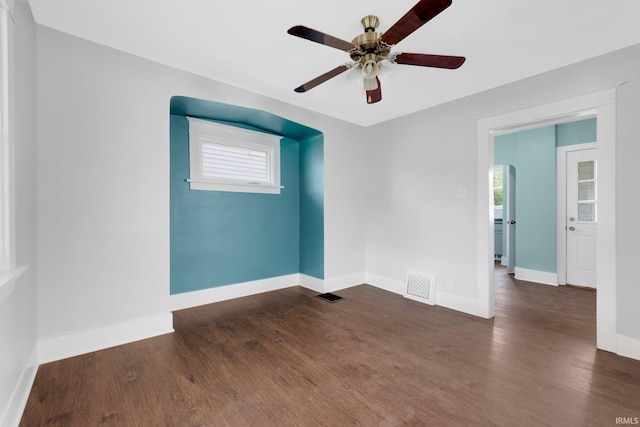 2922 Plaza Dr, Fort Wayne, IN 46806 - spare room with visible vents, a ceiling fan, baseboards, and wood finished floors