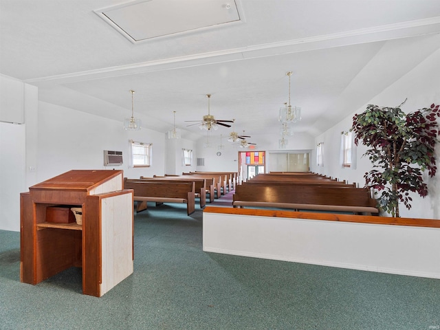 interior space featuring carpet flooring, a ceiling fan, and a wealth of natural light