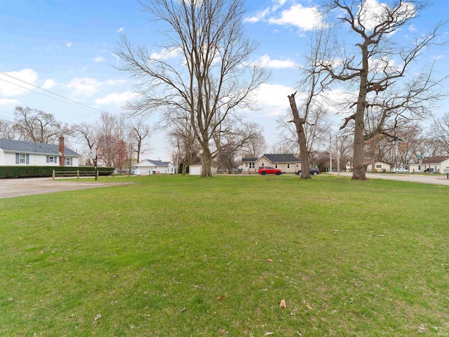 view of yard featuring a residential view