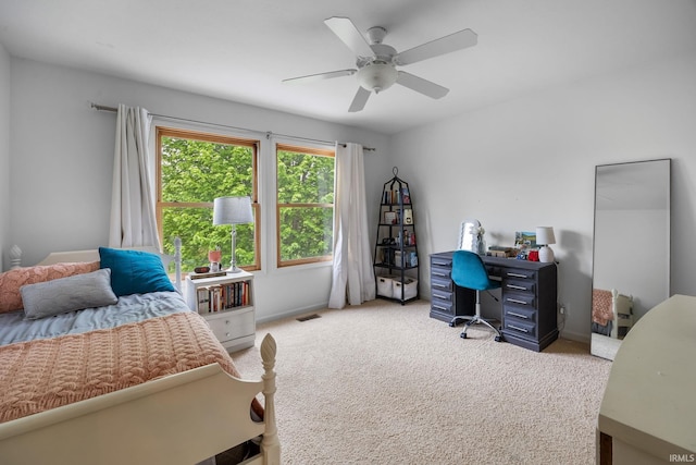 bedroom with visible vents, carpet, and ceiling fan