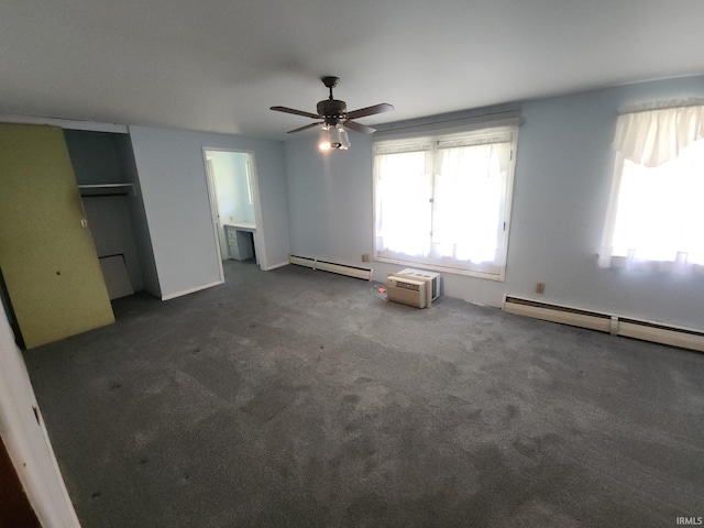 2708 Elmwood Dr, Logansport, IN 46947 - unfurnished bedroom with carpet flooring, a ceiling fan, and baseboard heating