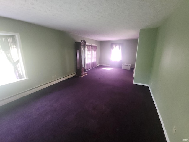 2708 Elmwood Dr, Logansport, IN 46947 - carpeted spare room featuring baseboards and a textured ceiling