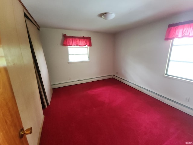 2708 Elmwood Dr, Logansport, IN 46947 - unfurnished bedroom featuring carpet flooring and baseboard heating