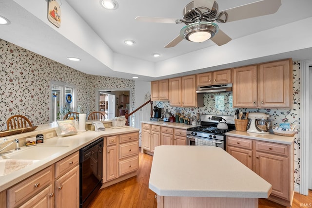 kitchen with a ceiling fan, dishwasher, stainless steel gas stove, and wallpapered walls