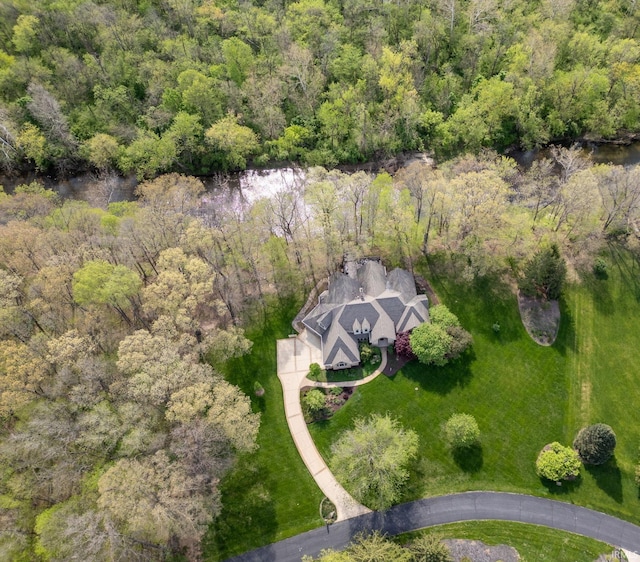aerial view featuring a view of trees