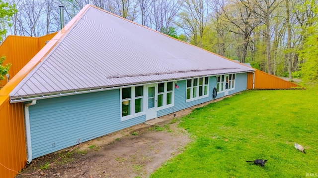 479 W 250 S, Wabash, IN 46992 - rear view of house featuring metal roof and a lawn