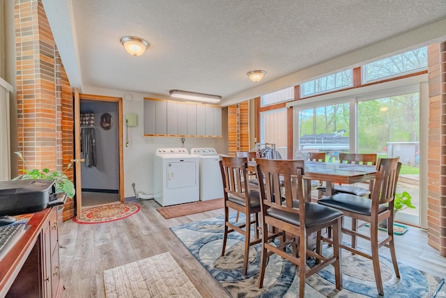 479 W 250 S, Wabash, IN 46992 - dining room with separate washer and dryer, a textured ceiling, light wood-style floors, and baseboards