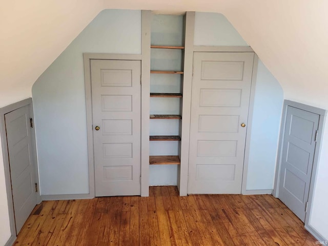 1614 Longley Ave, South Bend, IN 46628 - interior space with vaulted ceiling and hardwood / wood-style flooring