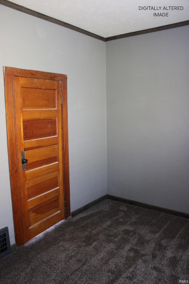 1614 Longley Ave, South Bend, IN 46628 - spare room featuring baseboards, ornamental molding, dark colored carpet, and visible vents