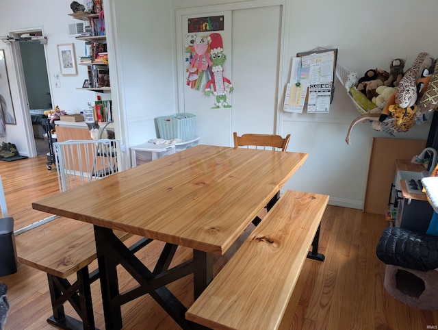 dining area featuring wood finished floors