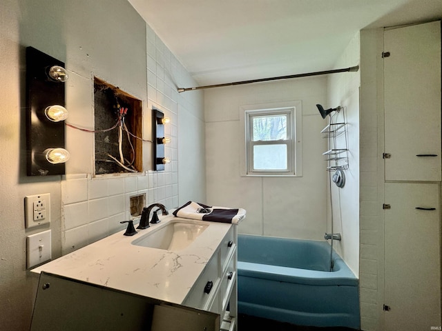 bathroom with shower / tub combination, decorative backsplash, and vanity
