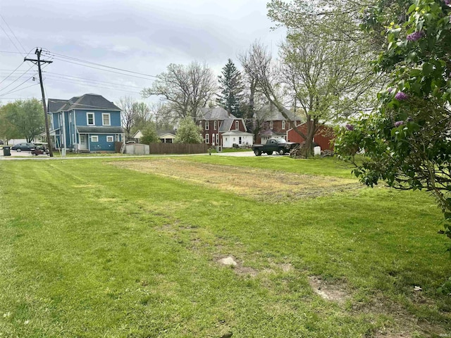 view of yard with fence