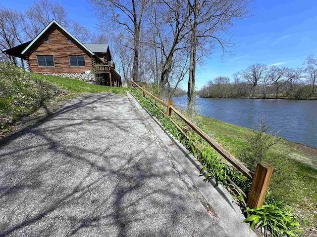 exterior space with a water view