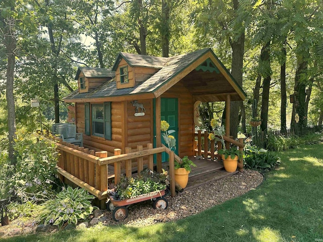 view of outbuilding with central AC and an outdoor structure
