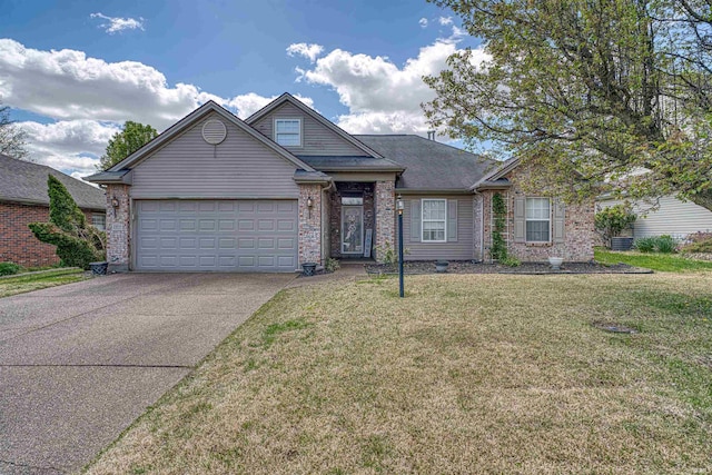 view of front of property with brick siding, a garage, a front lawn, and concrete driveway