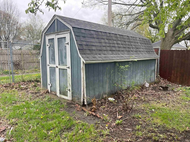 1134 N Iowa St, South Bend, IN 46628 - view of shed with a fenced backyard