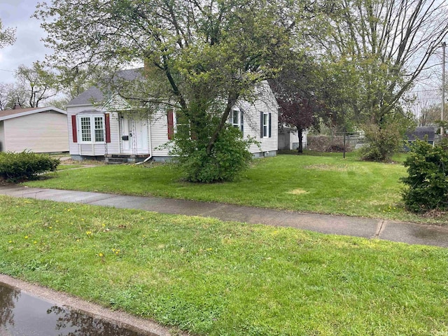 1134 N Iowa St, South Bend, IN 46628 - view of front facade with a front lawn and fence