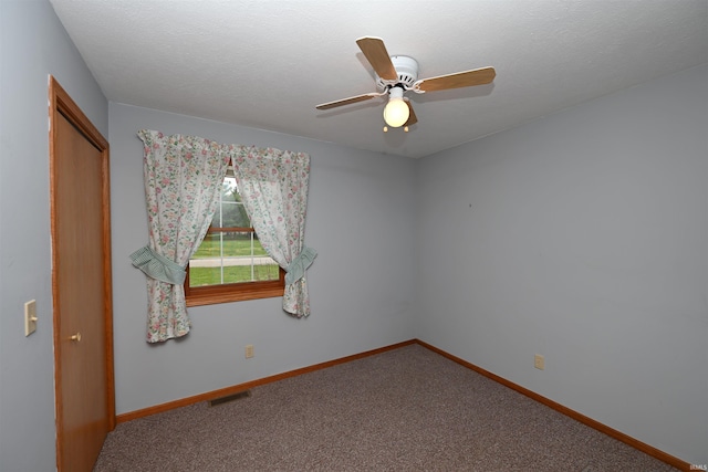 800 E Oak View Est, Winamac, IN 46996 - empty room featuring carpet floors, ceiling fan, visible vents, and baseboards