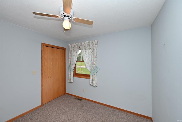 800 E Oak View Est, Winamac, IN 46996 - carpeted spare room with visible vents, baseboards, and ceiling fan