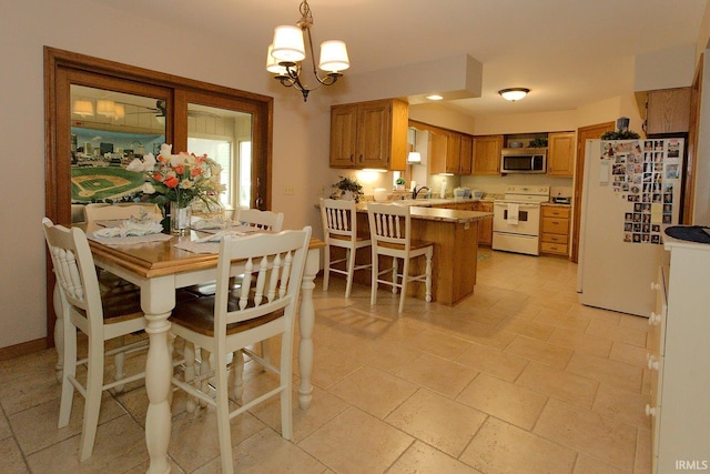 dining room with an inviting chandelier