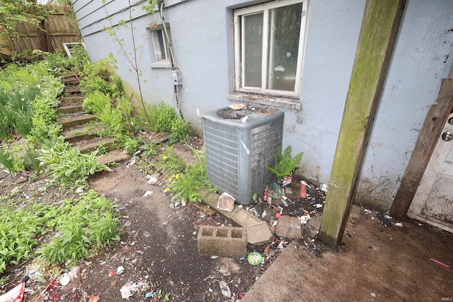 exterior details with fence and central AC