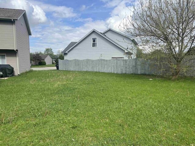 view of yard with fence