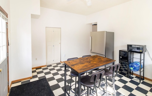 office featuring tile patterned floors and baseboards