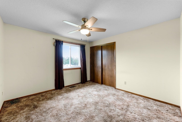 5155 E 200 N, Columbia City, IN 46725 - unfurnished bedroom with a closet, baseboards, carpet floors, and ceiling fan