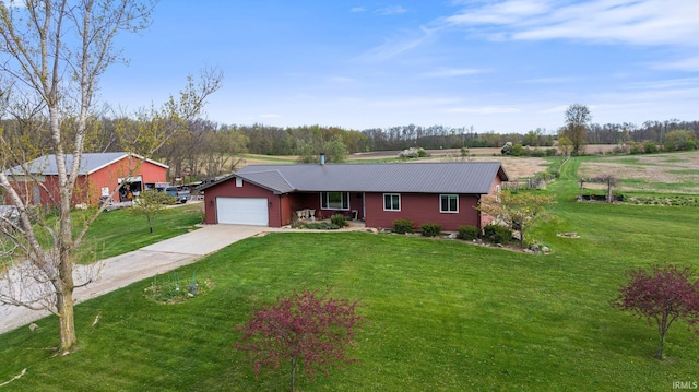 5155 E 200 N, Columbia City, IN 46725 - single story home featuring an attached garage, metal roof, a front yard, and concrete driveway