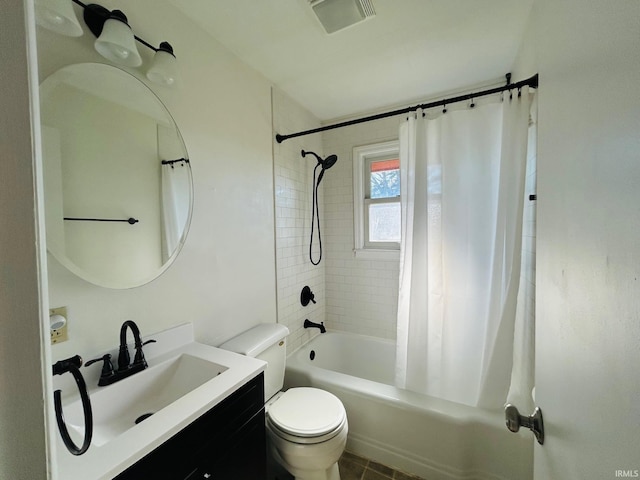 bathroom featuring visible vents, shower / bath combo, toilet, and vanity