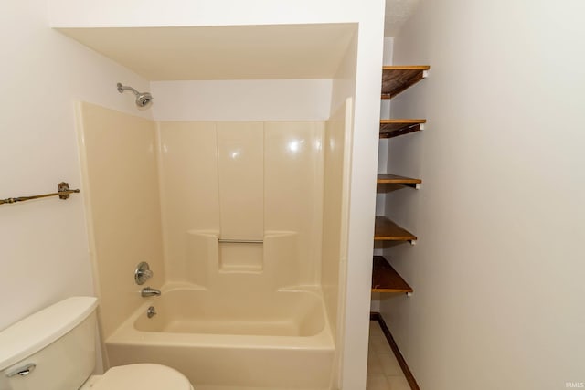 bathroom featuring tile patterned flooring,  shower combination, and toilet