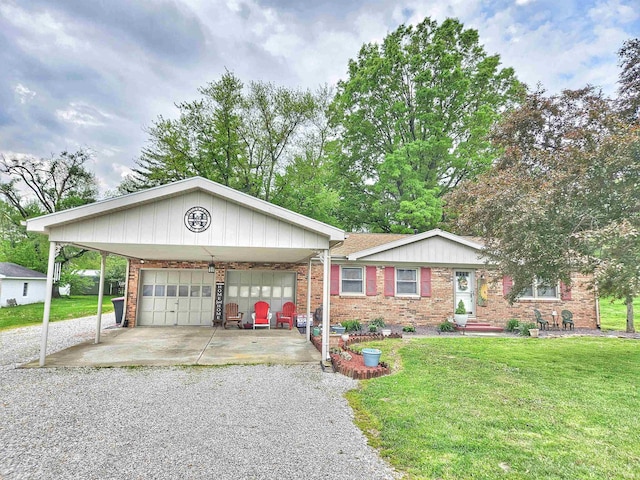 single story home featuring brick siding, a front lawn, and gravel driveway
