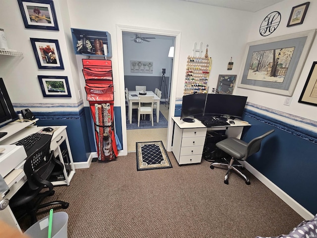 carpeted office with ceiling fan