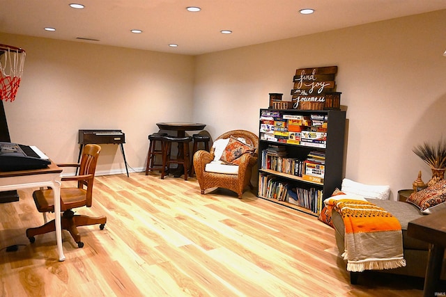 office area with recessed lighting, baseboards, and wood finished floors
