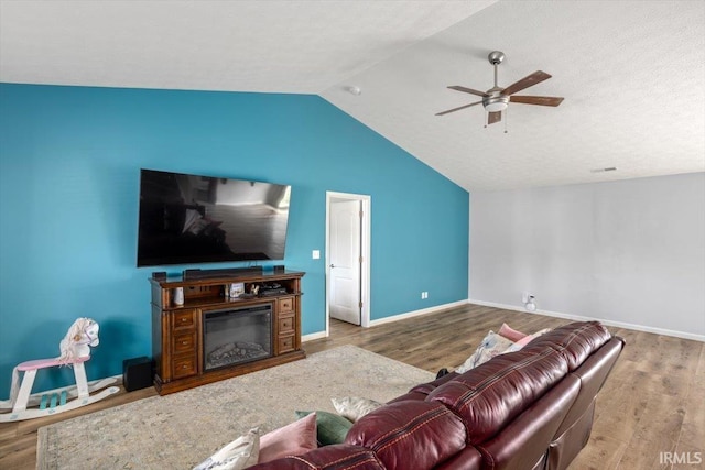 359 Limestone Ct, Lafayette, IN 47909 - living room with baseboards, ceiling fan, vaulted ceiling, and wood finished floors
