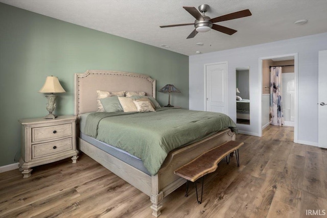 359 Limestone Ct, Lafayette, IN 47909 - bedroom featuring a ceiling fan, baseboards, and wood finished floors