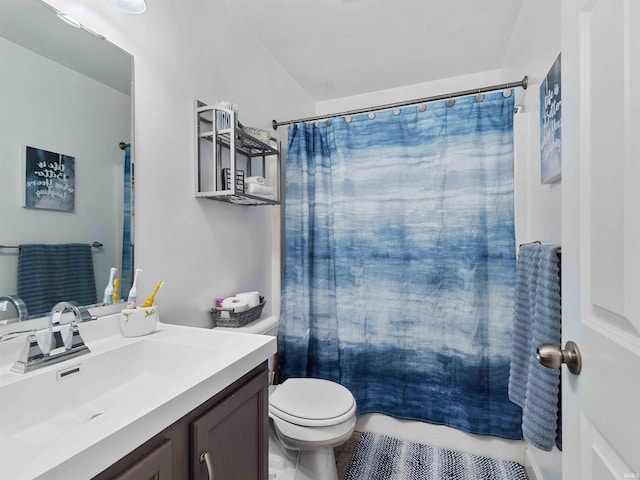 5326 Dennison Dr, Fort Wayne, IN 46835 - bathroom featuring toilet, a shower with shower curtain, and vanity