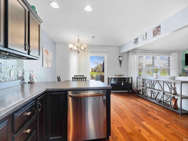 5326 Dennison Dr, Fort Wayne, IN 46835 - kitchen featuring a notable chandelier, light wood-style floors, dishwasher, a peninsula, and recessed lighting